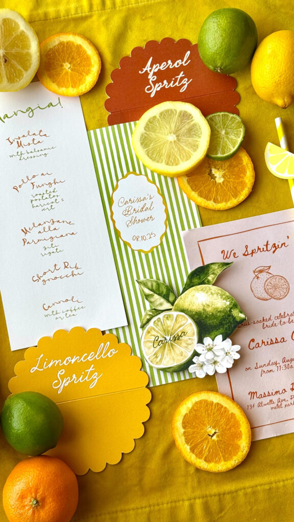 Citrus-themed stationery and menus styled for Italian Garden Weddings with bold colors and fresh fruit details.