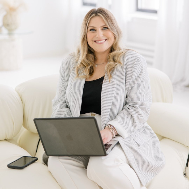 Wedding planner Carissa Corsi smiling during a planning session for a full-service wedding weekend.