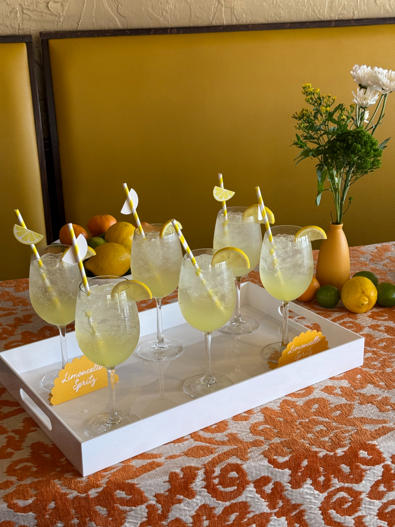 Limoncello spritz cocktails served on a tray