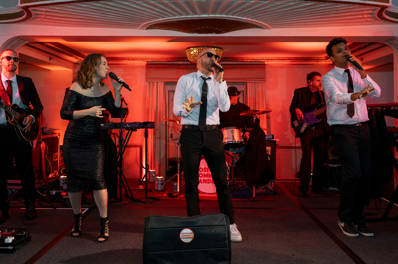 Live band energizing the dance floor, part of creating an inclusive wedding experience for all guests.