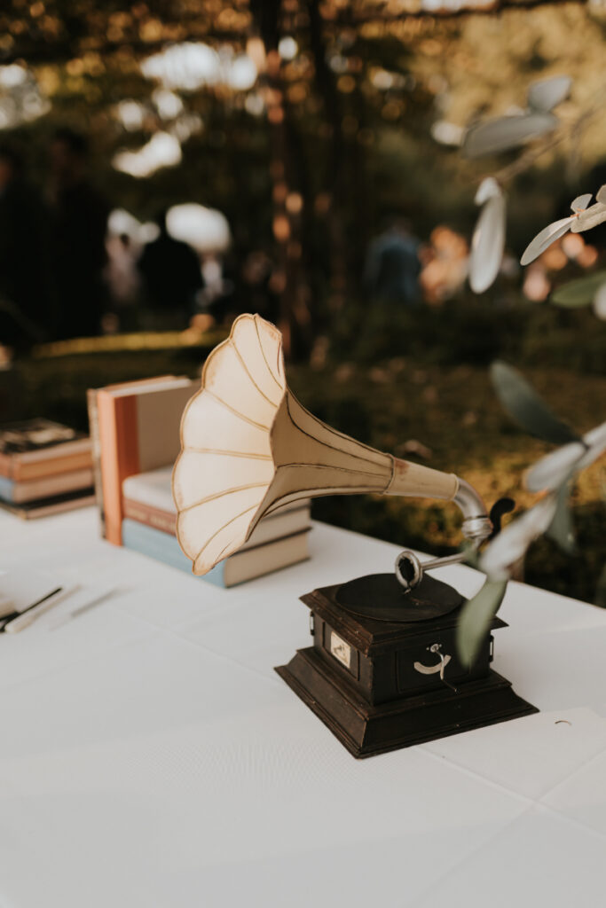 Vintage gramophone detail at Italian countryside wedding cocktail hour.