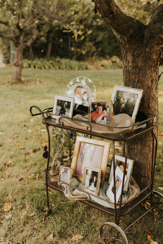 Family photo display at a wedding celebration.