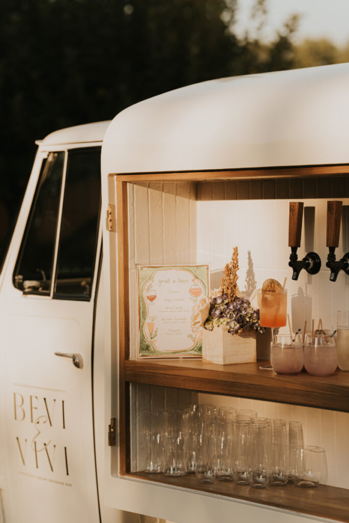 Close up of beer taps at Italian countryside wedding cocktail bar.