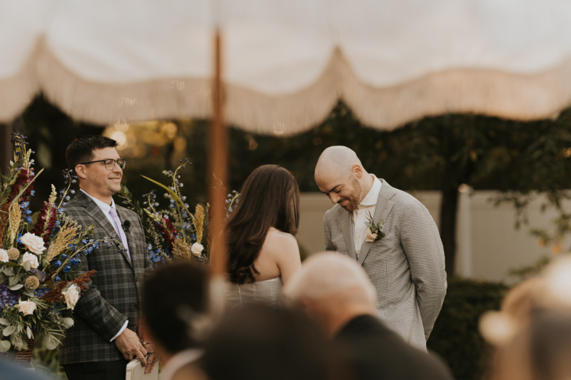 Close up of groom’s shoes on lawn at Italian countryside wedding.
