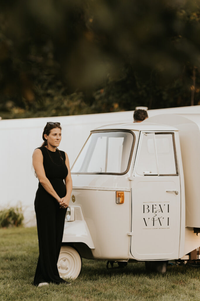 Mobile bar setup at Italian countryside wedding cocktail hour.