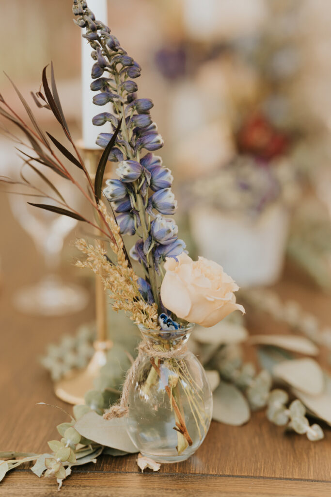 Blue and neutral floral detail at Italian wedding reception.