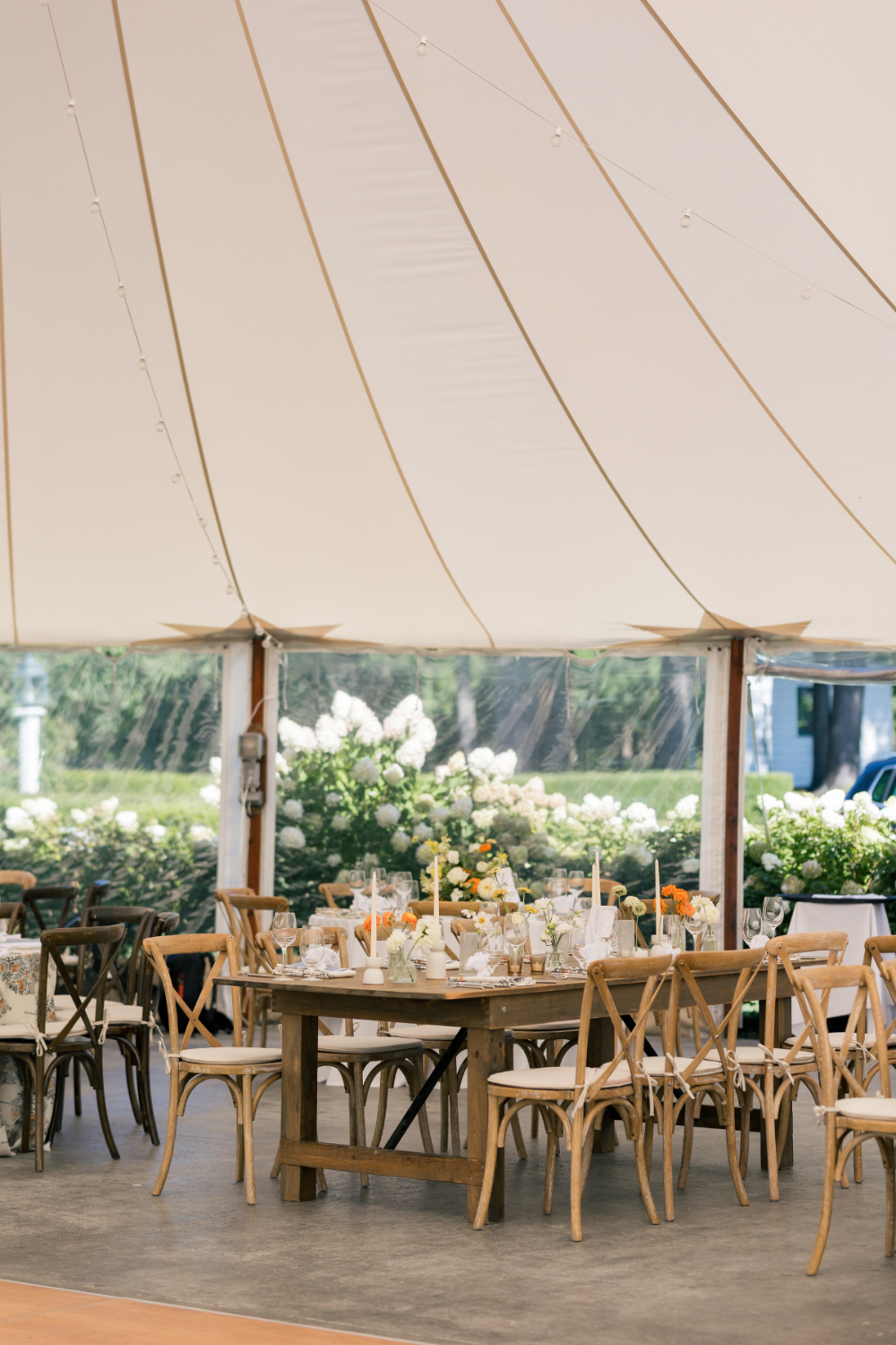 an outdoor tented wedding designed by a Rhode Island wedding planner