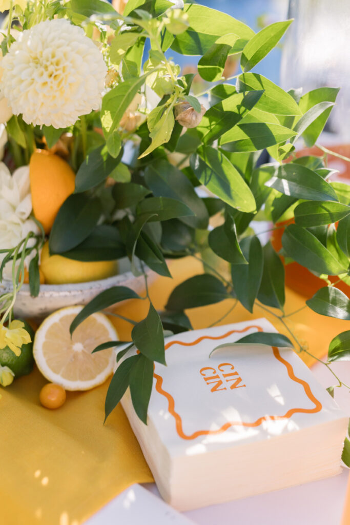Wedding rings in green velvet box with citrus and florals at a wedding at Connemara House.