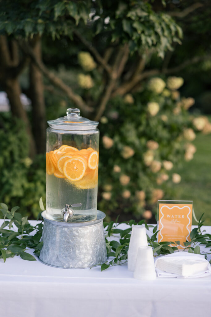 Outdoor cocktail table with Italian snacks and grissini at a wedding at Connemara House.