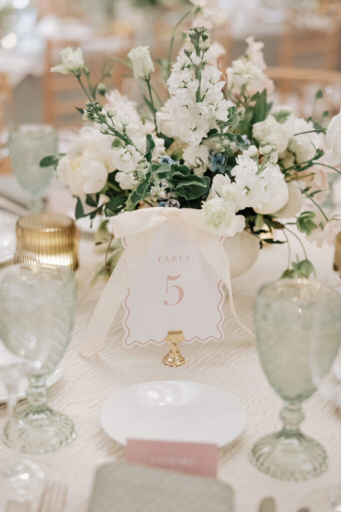 Paper goods meeting design (as they should)—custom table numbers that feel like part of the overall aesthetic, not an afterthought