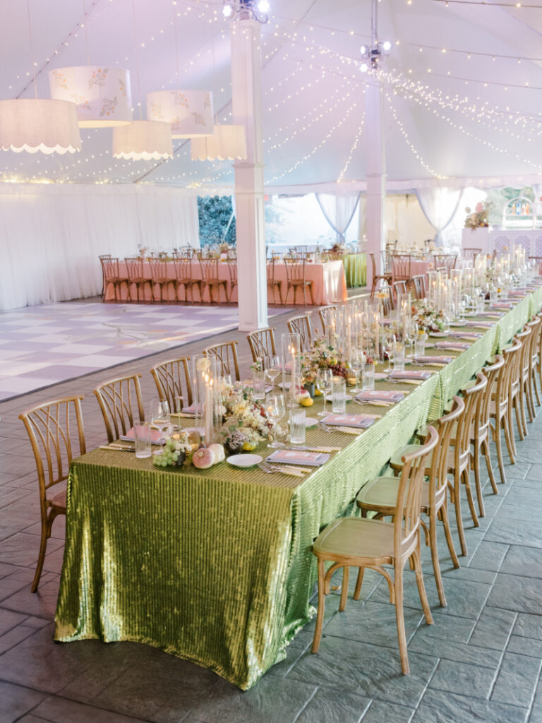 Wedding design ideas featuring long tables, textured linens, and candlelight for an elevated tented dinner
